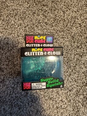 Viral NeeDoh Nice Cube Glitter & Glow Super Solid Squish - Teal Glitter
